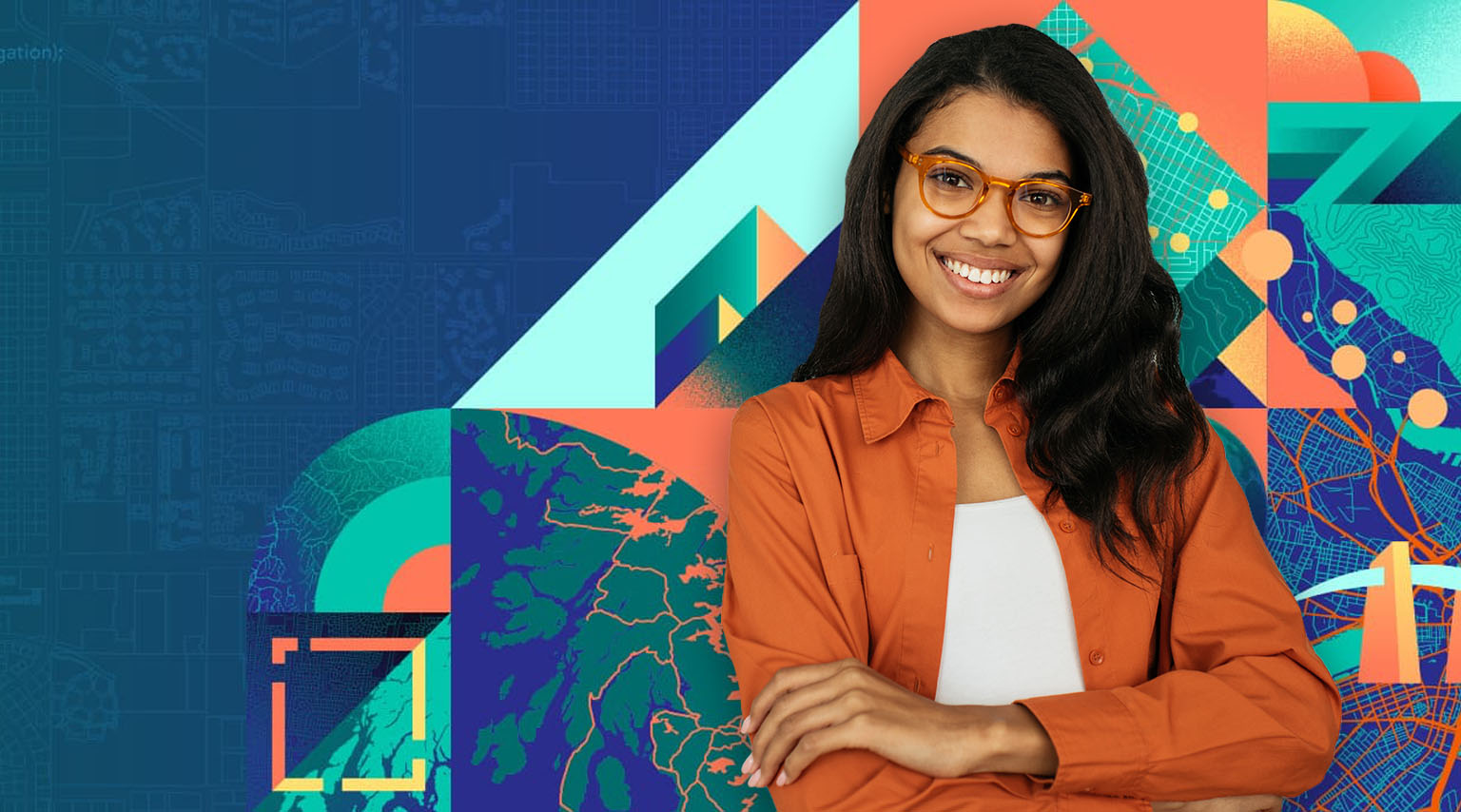 A woman in an orange shirt and orange glasses smiles against a colorful background while attending an Esri event